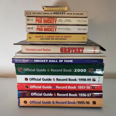 LOT 156: Fifteen Various Paperback Hockey Books and Hockey/Baseball Trading Cards