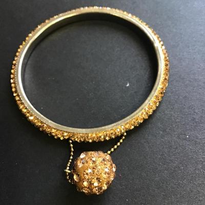Silver tone rhinestone bracelet with ball charm