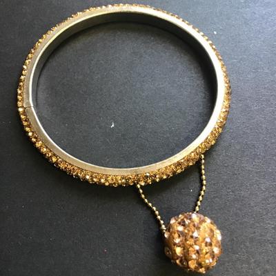 Silver tone rhinestone bracelet with ball charm