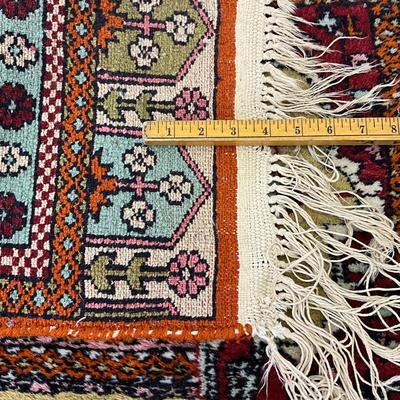 Sale Photo Thumbnail #975: Measurements:
9'2" in Length, 2'7" in width
Rug is in good condition