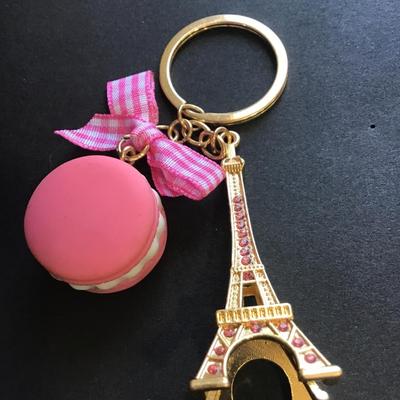 Gold toned Eiffel Tower keychain with macaroon charm