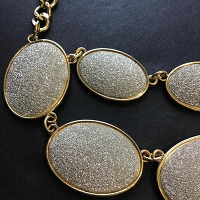 Pretty silver metallic plates bib statement necklace