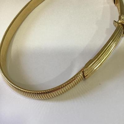 Very nice vintage 80s Accessocraft NYC Gold toned stretchy Goldbelt excellent condition