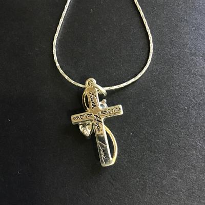 Silver tone necklace with cross charm