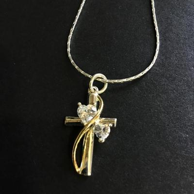 Silver tone necklace with cross charm