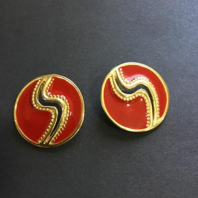 Gold toned red enameled circular stud earrings