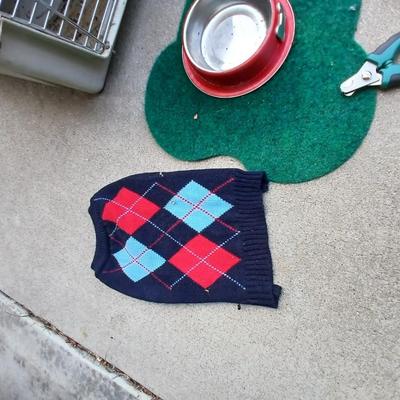 Dog carrier with an assortment of dog supplies - Bowls- clothes - leashed and more