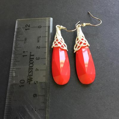 Red faux crystal silver tone dangle earrings