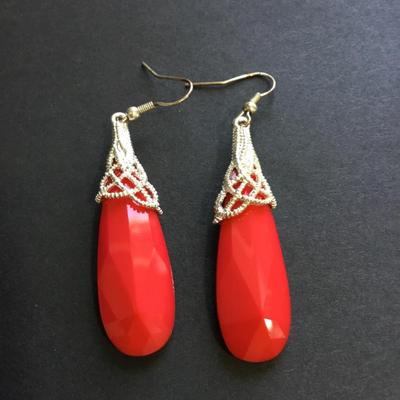 Red faux crystal silver tone dangle earrings