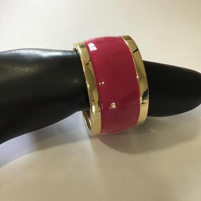Large, chunky gold, toned, pink enamel hinged bracelet