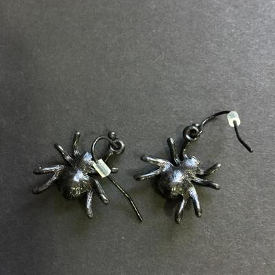 Black spider dangle earrings with red rhinestones
