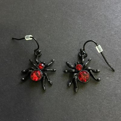 Black spider dangle earrings with red rhinestones