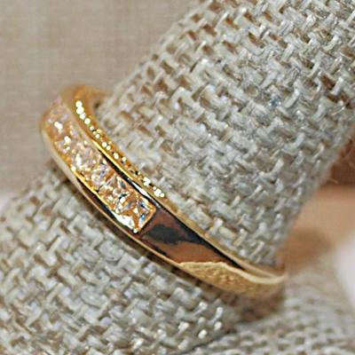 Size 10 Half Infinity Style Ring with Single Row of 13 Clear Stones on a Gold Tone Band (3.9g)