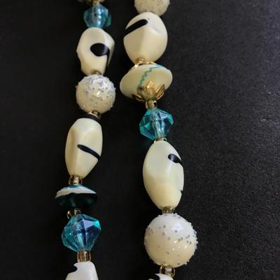 White and blue beaded necklace