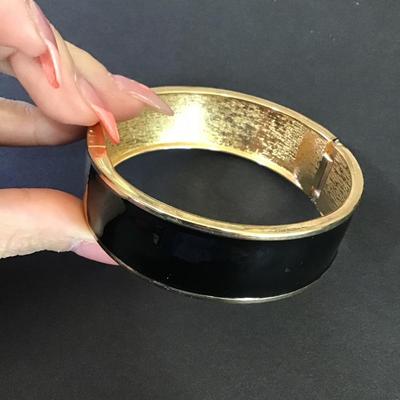 Large chunky gold, toned, black enamel, hinged, magnetic bangle bracelet