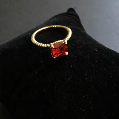 Pretty ruby red gold toned cocktail ring