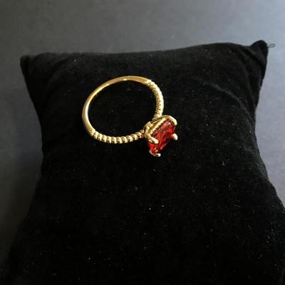 Pretty ruby red gold toned cocktail ring