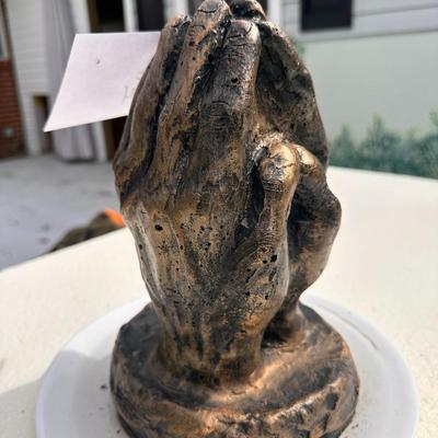Concrete praying hands