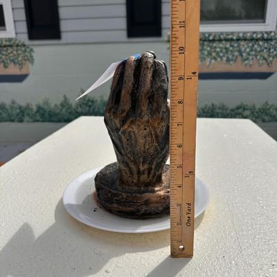 Concrete praying hands