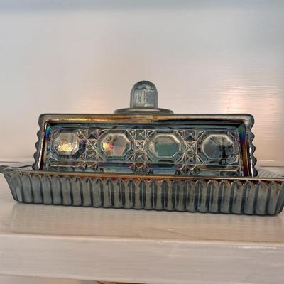 Blue carnival glass butter server with lid