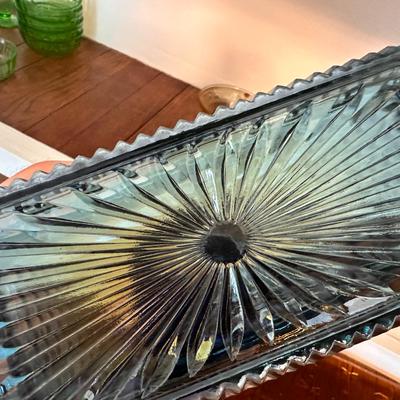 Blue carnival glass butter server with lid
