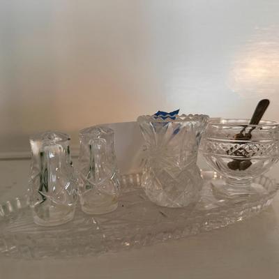 Crystal glass cruet set on tray