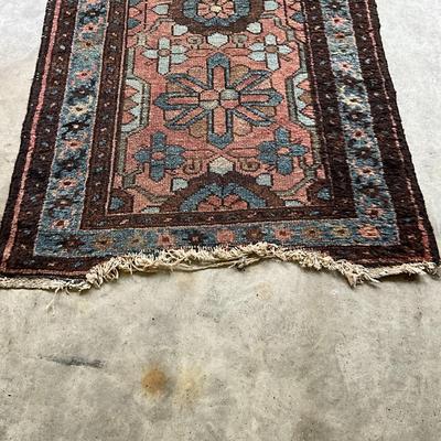 Sale Photo Thumbnail #1023: Has large flower medallion in center of rug
Ends are damaged, one end has material loss, see pictures
Measurements:
47" in length, 27.5" in width