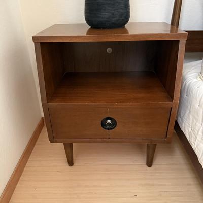 Sale Photo Thumbnail #13: The Stanley nightstands are a mid-century modern piece crafted from walnut, featuring a medium wood tone and a brown finish. It measures 20 inches in width, 12 inches in depth, and 24.5 inches in height. Designed for the bedroom, this original piece from 