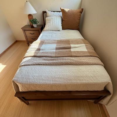 Sale Photo Thumbnail #28: This Kent Coffey headboard is a full-size piece crafted from walnut and rosewood, showcasing a Mid Century Modern style with elegant curved detailing. It is an original piece from the mid-20th century, designed for adults. The headboard features an authen