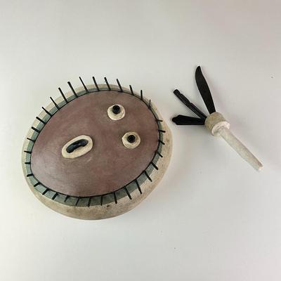 Sale Photo Thumbnail #1089: Depicting a face expression with a head feather
Measurements:
9" in height, 5" in width