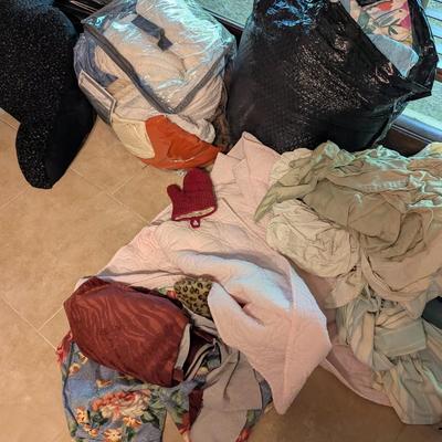 Assortment Of Linens Sheets Blankets Pillows