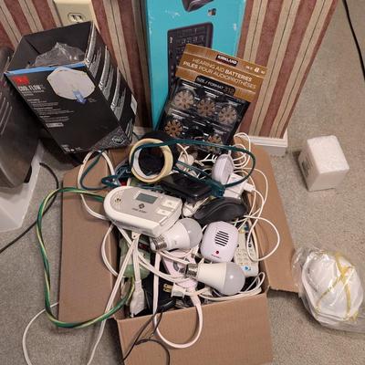 Assortment Of Cords Lights Batteries Logitech Keyboard