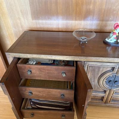 Sale Photo Thumbnail #33: The Nadeau credenza is a mid-century modern piece crafted from walnut, featuring a rich walnut finish. It measures 30 inches in height, 76.5 inches in length, and 19 inches in width. This rectangular, free-standing unit includes two doors with raised pane