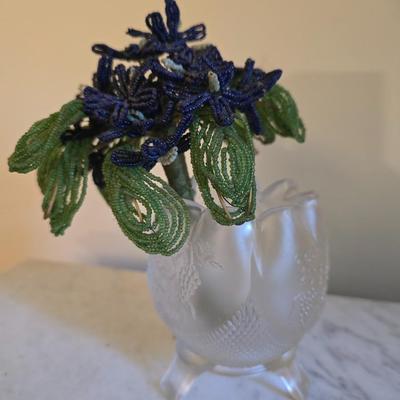 Glass Vase with beaded flowers.
