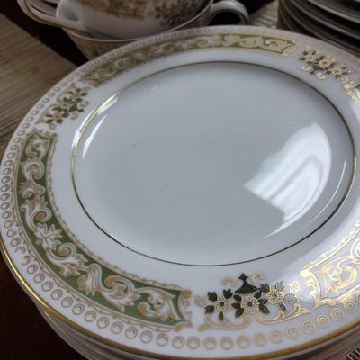 Sale Photo Thumbnail #8: 2 serving platters, 11 dinner plates, 12 salad plates, 11 bread & butter plates, 17 teacups, 12 saucers, 12 dessert bowls, 11 soup bowls, cream & sugar and gravy boat.

One or two pieces have chips but the setbas a whole is in great condition