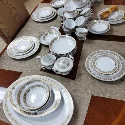 Sale Photo Thumbnail #4: 2 serving platters, 11 dinner plates, 12 salad plates, 11 bread & butter plates, 17 teacups, 12 saucers, 12 dessert bowls, 11 soup bowls, cream & sugar and gravy boat.

One or two pieces have chips but the setbas a whole is in great condition