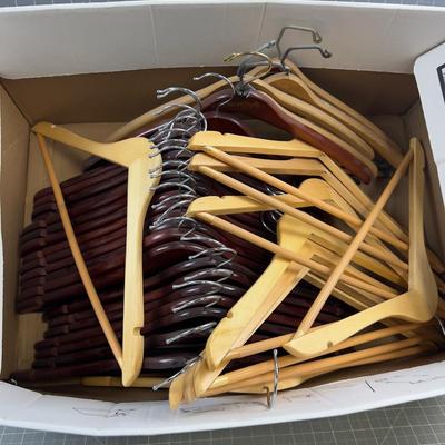 Box full of WOOD Hangers 