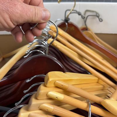 Box full of WOOD Hangers 