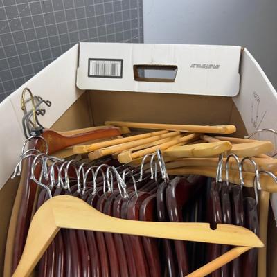 Box full of WOOD Hangers 