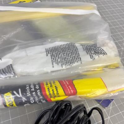 Glue Stick and a Glue Gun 