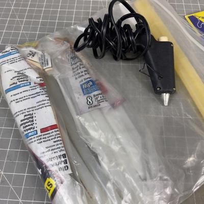 Glue Stick and a Glue Gun 
