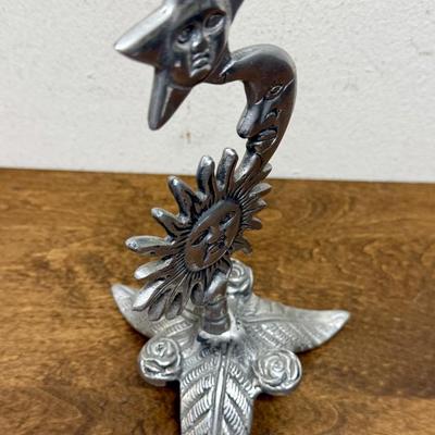 Sale Photo Thumbnail #349: Leaf tripod base. Missing the candle holder at the top.  In good condition, approx. x" tall.