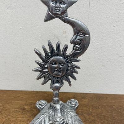 Sale Photo Thumbnail #346: Leaf tripod base. Missing the candle holder at the top.  In good condition, approx. x" tall.