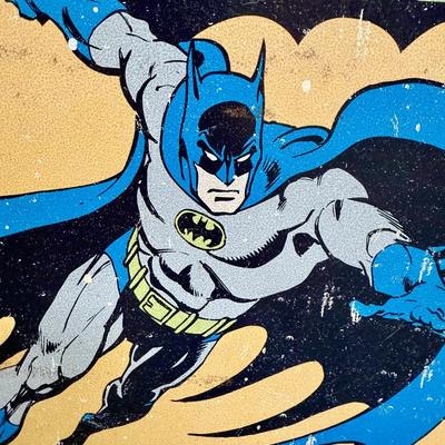 Sale Photo Thumbnail #165: Painted metal sign with an image of the classic 1930’s DC comics Batman. Image is distressed to make it look old.