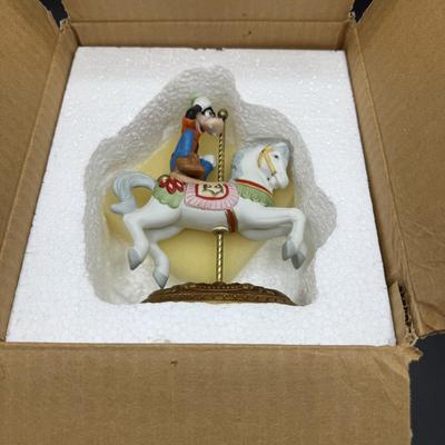 Sale Photo Thumbnail #390: With original box. Was repaired, goofy figure was re-attached to the saddle. Not too noticeable, See photos for details. No other visible marks or damage of any kind.