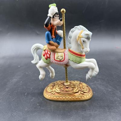 Sale Photo Thumbnail #380: With original box. Was repaired, goofy figure was re-attached to the saddle. Not too noticeable, See photos for details. No other visible marks or damage of any kind.