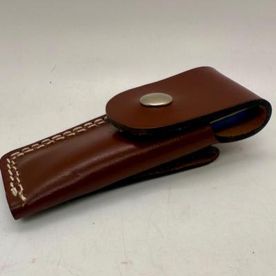 Sale Photo Thumbnail #479: Used, but in good condition. Comes with a leather carrying pouch with a belt loop. Can be used to sharpen different types of tools, including gardening tools.