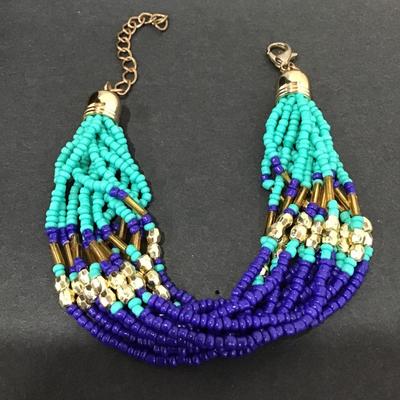 Really pretty turquoise and blue gold toned beaded bracelet