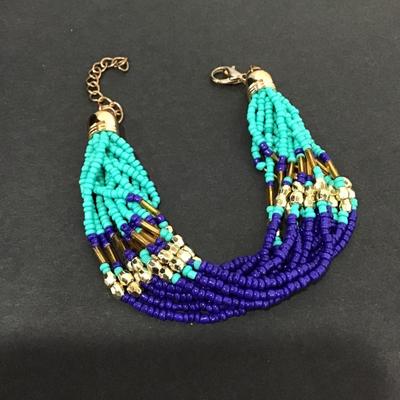 Really pretty turquoise and blue gold toned beaded bracelet