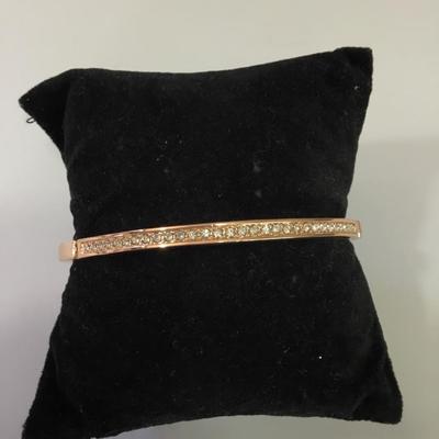 Pretty rose, gold, toned, rhinestone, locking bracelet